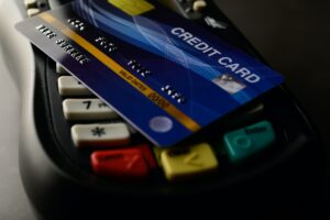 Credit cards placed on credit card swipes